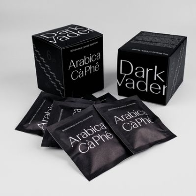 Boxes and sachets of Dark Vader Arabica Cà Phê by Bosgaurus Coffee Roasters.